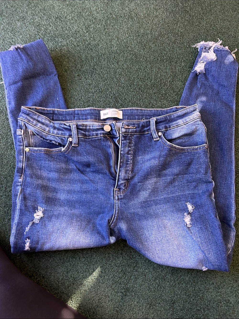BKE Skinny Jeans in Blue with Distressed Knees. Parker style